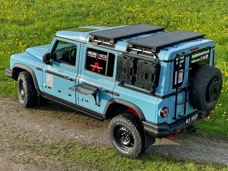 Grenadier with accessories: table, MOLLE grilles, fuel cells, platforms, spare wheel holder